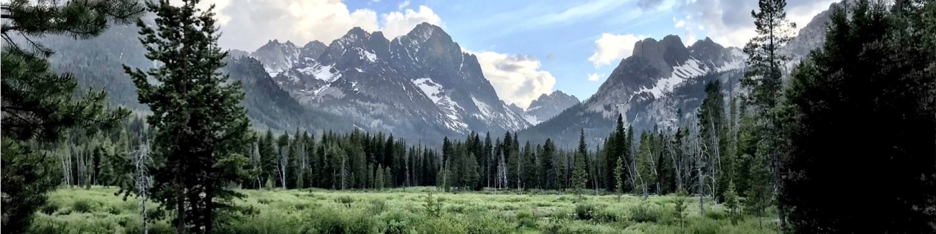 Idaho's Sawtooth Mountains beneath an open sky